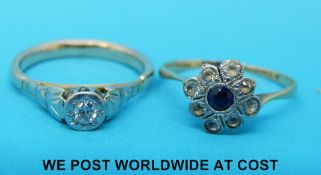 A yellow metal ring set with a diamond in an illusion setting and an 18ct gold ring set with a