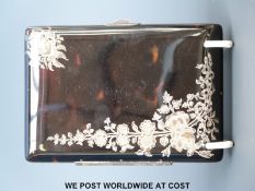 A 19thC silver pique work dance card case with ivory leaf inside