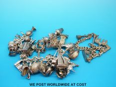 A white metal bracelet and one other