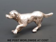 A miniature hallmarked silver dog, London 1902, Singleton, Benda & Co Ltd., 5.