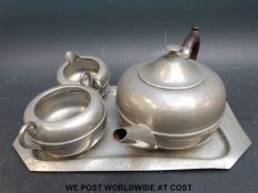 A Knighthood pewter tea set on tray with hammered finish
