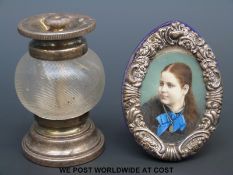 A hallmarked silver miniature picture frame with hand decorated miniature of a lady together with a