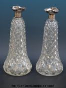 A pair of hobnail cut glass hallmarked silver mounted decanters, height 28cm, Sheffield 1916,