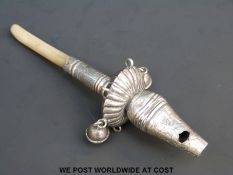 A Georgian hallmarked baby's rattle with mother of pearl handle, Birmingham 1823,