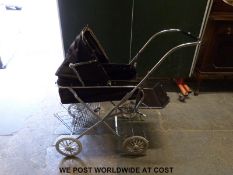 A Silver Cross pram.