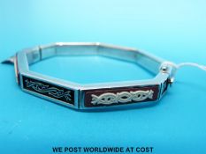 A silver bangle by Stephen Webster for Wedgwood in Thorn design