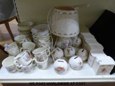 A large collection of Royal Doulton Bunnykins ware including several money boxes