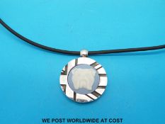 A silver pendant by Stephen Webster for Wedgwood depicting a bulldog 