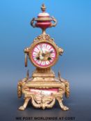 A French gilt mantel clock with Sevres style panel,