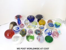 Twenty-five various glass paperweights some in form of animals, mushrooms, fruit, etc.