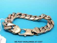 A 9ct rose gold gentleman's curb link bracelet (135g)