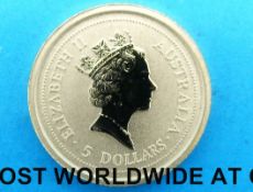 A 1/20 ounce Australian nugget miniature coin