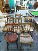 Nine various kitchen and bedroom chairs including a spindle back cane seated example