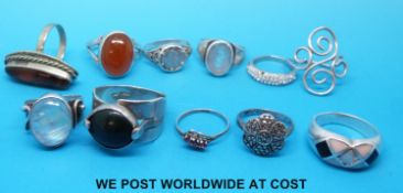 Eleven silver rings to include amber set,
