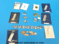 A collection of 9ct gold and silver bar brooches,