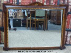 An inlaid/Tunbridge walnut mirror with bevelled glass (overall width 111cm,