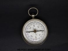 A novelty vesta formed as a compass, marked Moko to the dial,