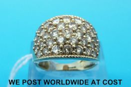 A yellow metal ring marked 585 set with sapphires,