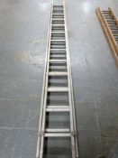A set of aluminium ladders.