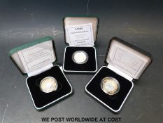 A silver proof cased Piedfort Rugby World Cup 1999 £2 coin, together with a silver proof example,