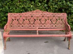 A Coalbrookdale or similar cast iron garden bench (width 162cm)