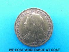 An 1899 gold half sovereign veiled head