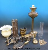 A brass oil lamp, trench art shell case, trivet etc.