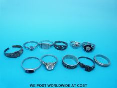 Eleven silver rings including one set with cubic zirconia and one with blue john, a Mizpah ring,
