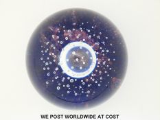 Five Caithness glass paperweights,