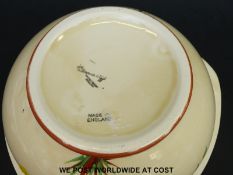 A Clarice Cliff salad bowl and servers,