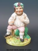A Staffordshire Toby figure
