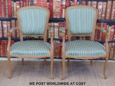 A pair of upholstered French-style chairs