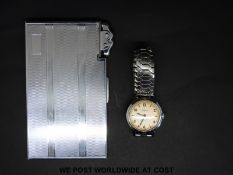 A gents Ingersoll c1950s wristwatch in original box together with a cigarette lighter and cigarette