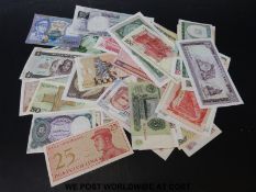 A collection of largely uncirculated overseas banknotes
