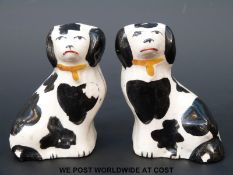 A pair of 19thC Staffordshire dogs (7.