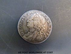 A George II shilling 1758 better than fine with good toning