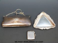 A hallmarked silver vesta and a triangular tray (59g) together with a silver plated purse