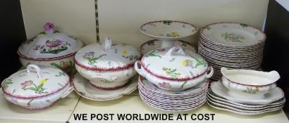 An extensive Longwy Marseille pattern dinner service including tureens, tazzas,