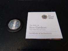 A cased and certificated silver proof Kew Gardens 50 pence coin