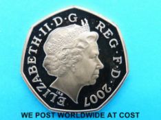 A gold proof 2007 fifty pence coin commemorating 100 years of Scouts,