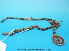 A yellow metal double Albert watch chain, marked 9ct,