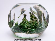 Baccarat rock or sand dune faceted glass paperweight with three stalagmite formations on moss green