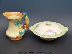 A Clarice Cliff Newport pottery Crocus pattern tureen and a Burleigh ware parrot jug