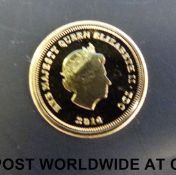 A Jubilee mint miniature gold one crown coin 2014