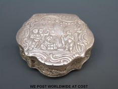 A Victorian hallmarked silver snuff box with shell back and allegorical scene to front,