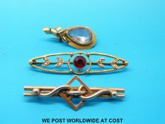 A Victorian brooch set with a quartz,