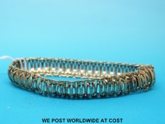 A 9ct gold bracelet (18.