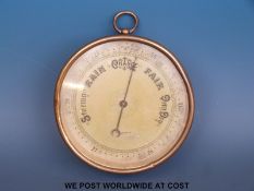 A Short and Mason dial barometer in brass case