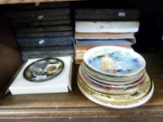 A quantity of collector's plates to include French scenery in Limoges porcelain,