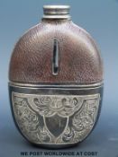 A plated leather hip flask with slip-off cup and sight glass, height 15.